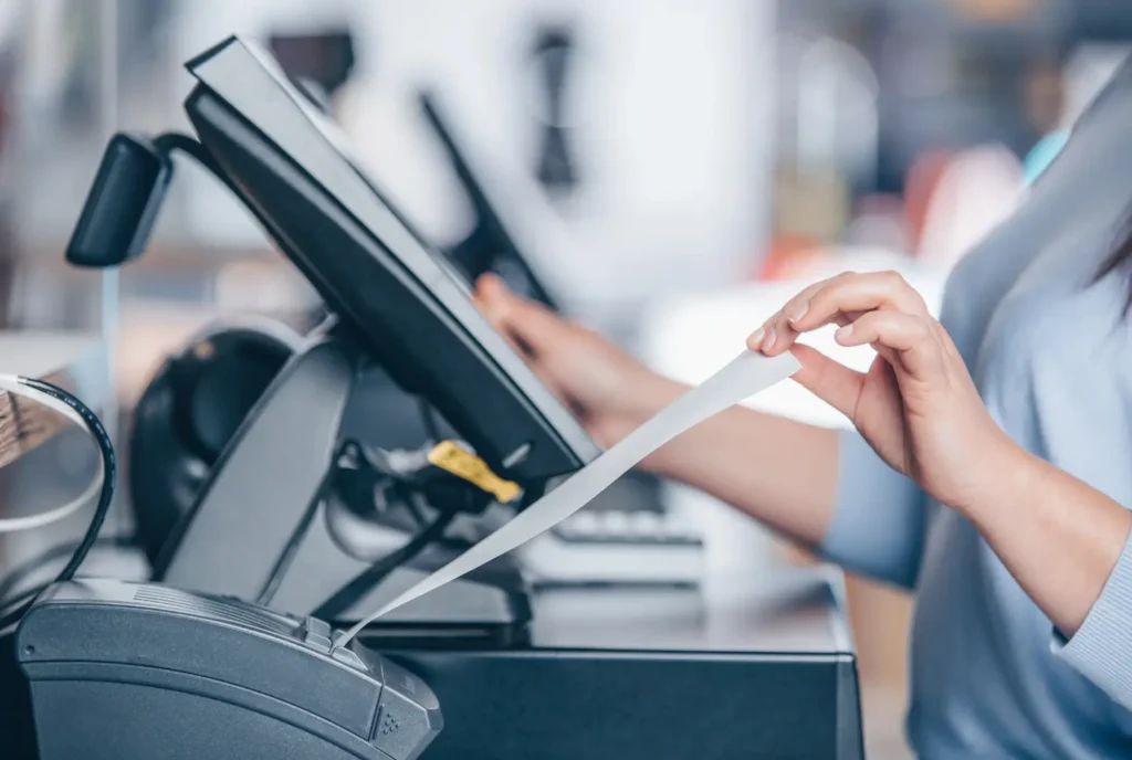 Saleswoman Printing Receipt